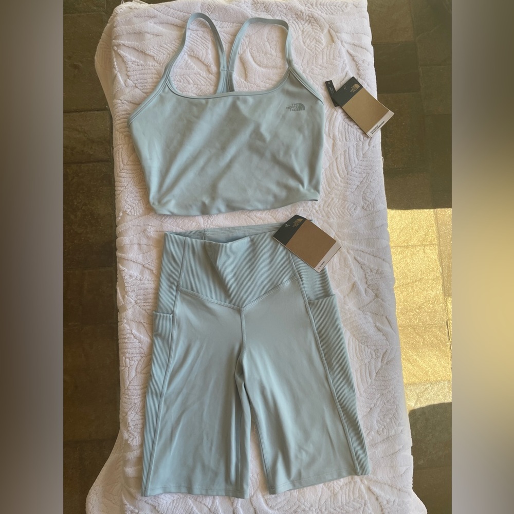 The North Face 9 inch short and crop tank set. Both size S. NWT color,beta blue